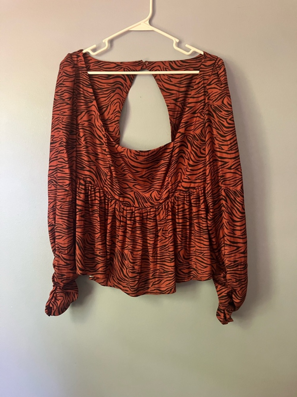 Free People Rust and Black Zebra Open-Back Peplum Blouse